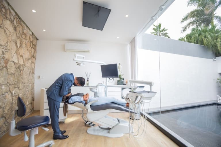 Dental patient receiving a dental treatment