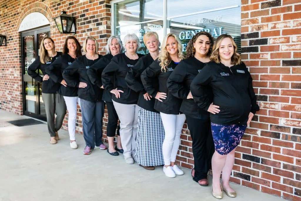 Female staff posing group photo