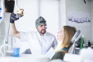 Dentist preparing to give a patient a dental exam