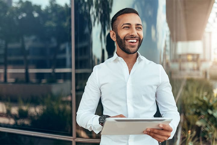 A man smiling with greater confidence.