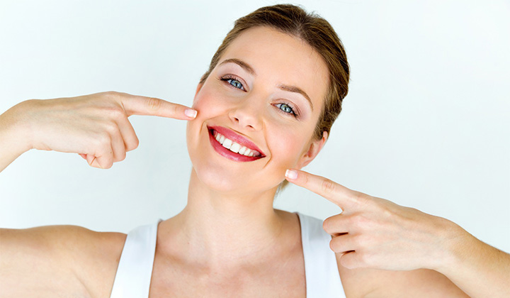 Young woman with a whiter and brighter smile.